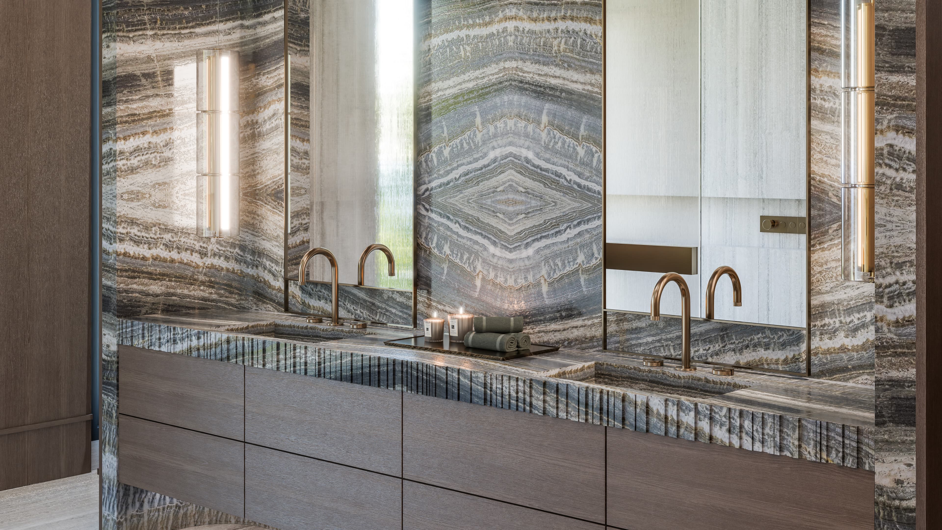 High-angle view of a luxury primary bathroom design emphasizing premium stone and tile integration.
